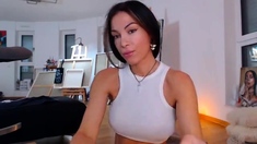 Russian brunette busty camgirl masturbating on webcam