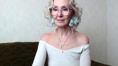 Mature blonde granny loves to masturbate her puss