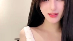 Naughty Japanese babe Ayaka Tomoda masturbates