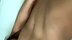 Amateur young brunette enjoys dildo on solo masturbation