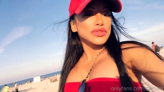 Busty babe playing with her big boobs