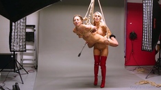 Ponytailed blonde in latex gloves and stockings