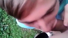 Twink sucks friends cock outside