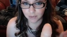 Nerdy Chick With Glasses Sucking Dildo And Masturbating